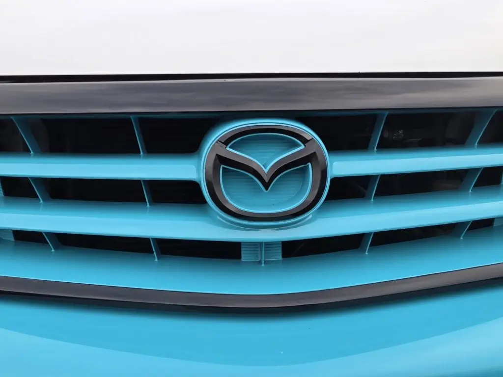 Completed Mazda Bongo Bronze Restoration in pearlescent turquoise, freshly detailed and ready for sale