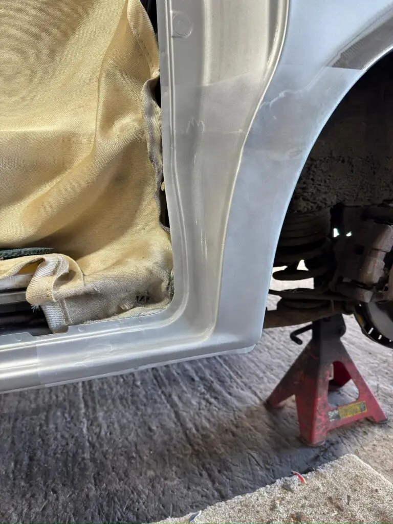 Seam welded Mazda Bongo rear arch showing perfect factory finish