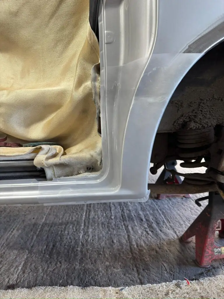 Seam welded Mazda Bongo rear arch showing perfect factory finish