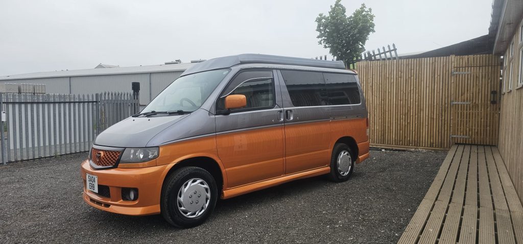 Completed Mazda Bongo respray in pearl orange and grey