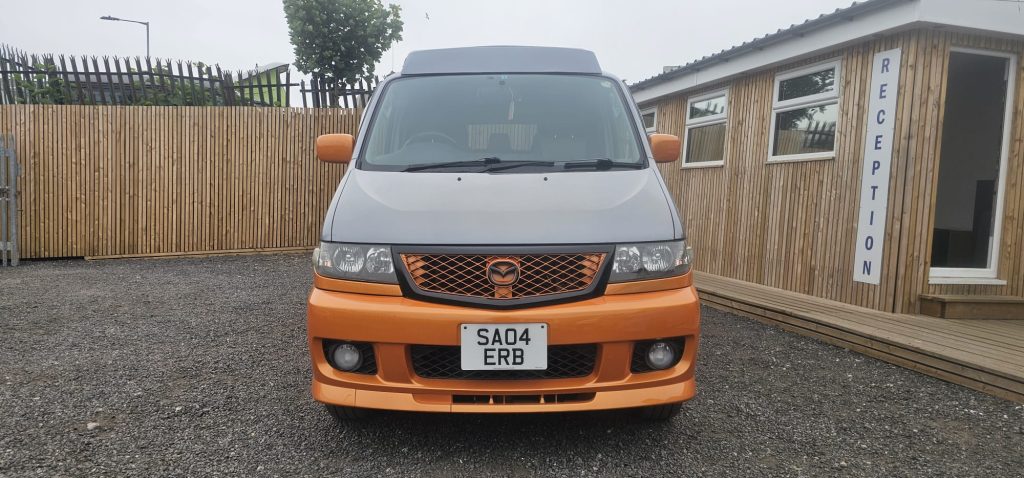 Completed Mazda Bongo respray in pearl orange and grey