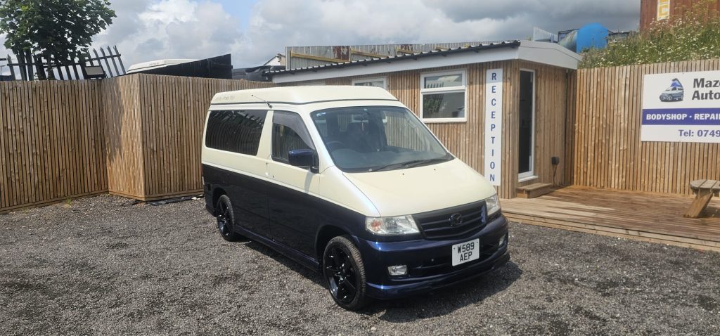 Mazda Bongo restored with metallic blue and pearl white two-tone finish