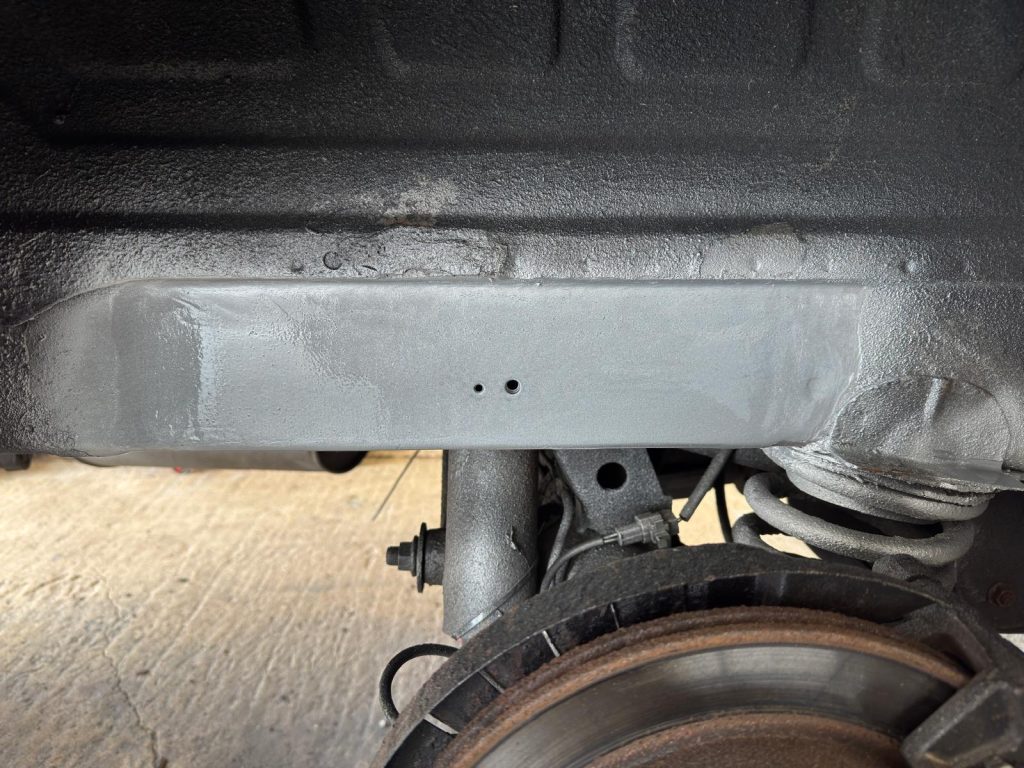Clean metal panels welded into Mazda Bongo