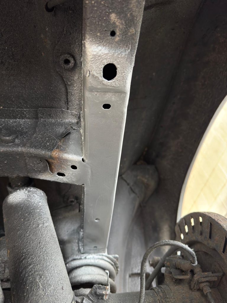Clean metal panels welded into Mazda Bongo