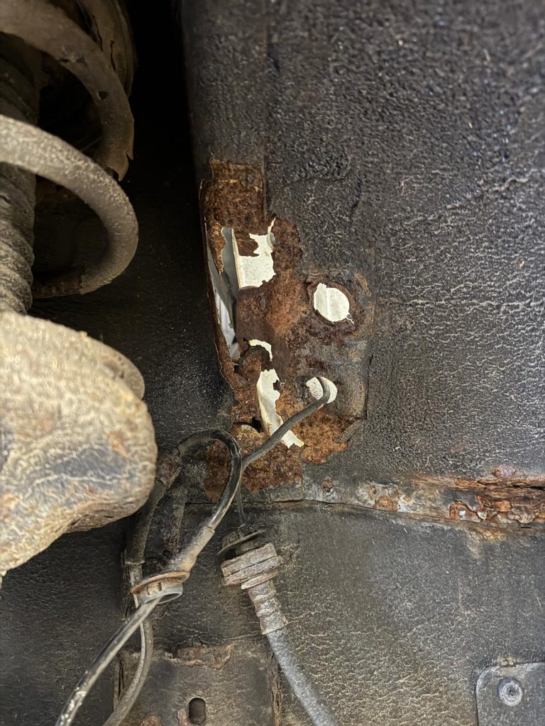 Severely corroded Mazda Bongo