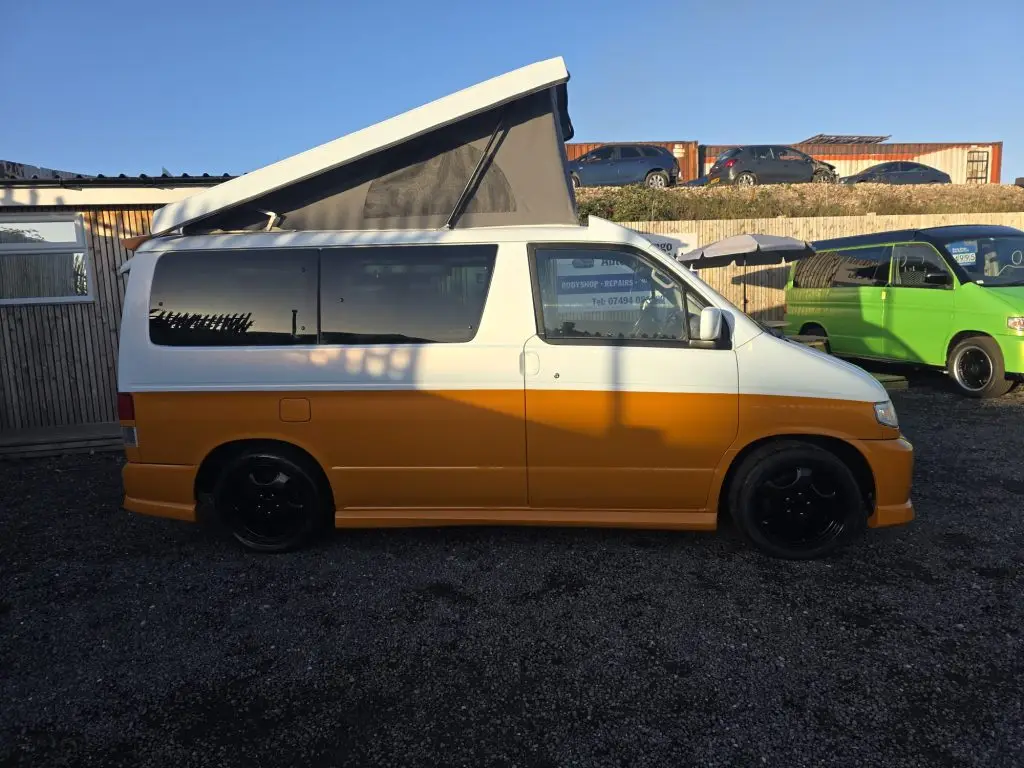 Mazda Bongo in white and orange with colour-coded trims and mirrors