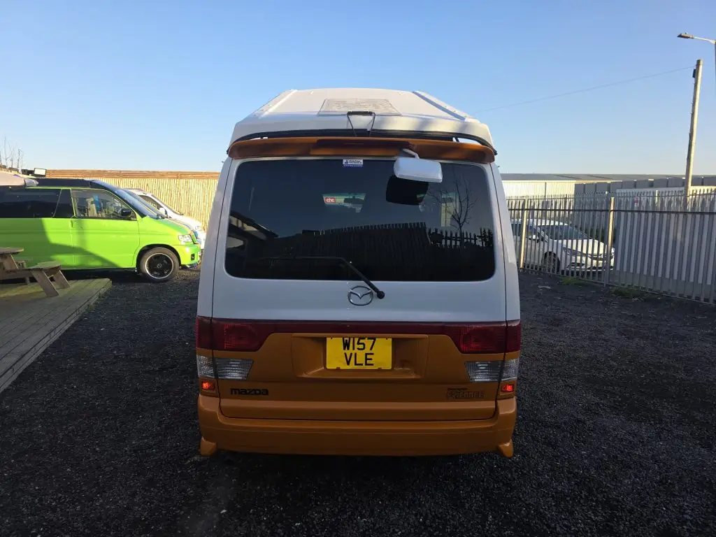 Mazda Bongo in white and orange with colour-coded trims and mirrors